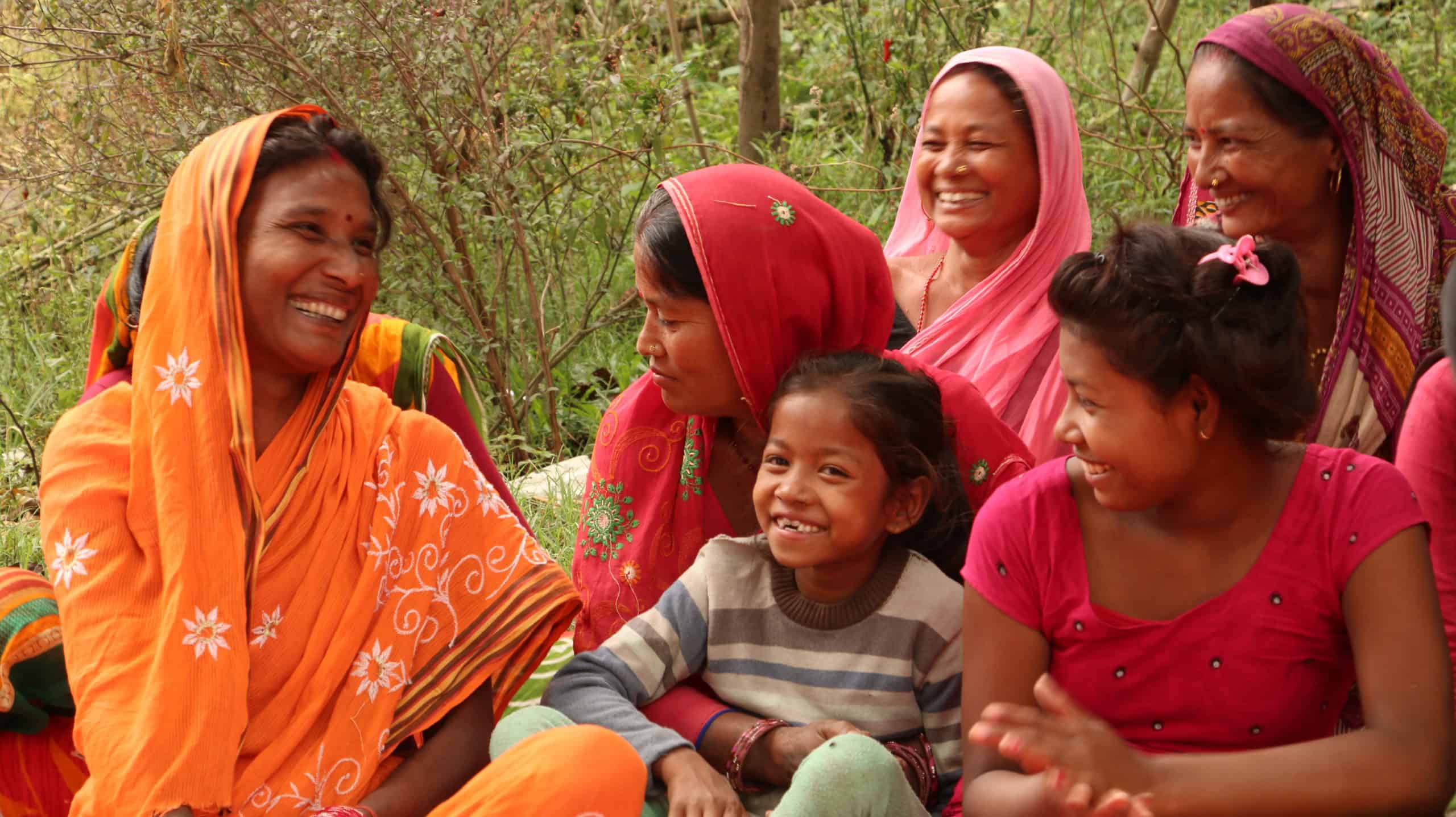 Nepali women smiling.