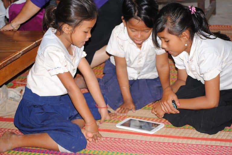 Nepal students use a tablet.