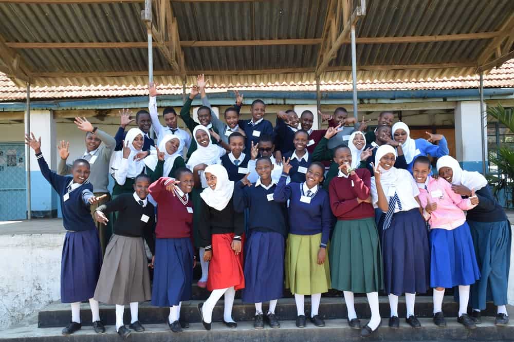 Tanzanian students posing for a photo.
