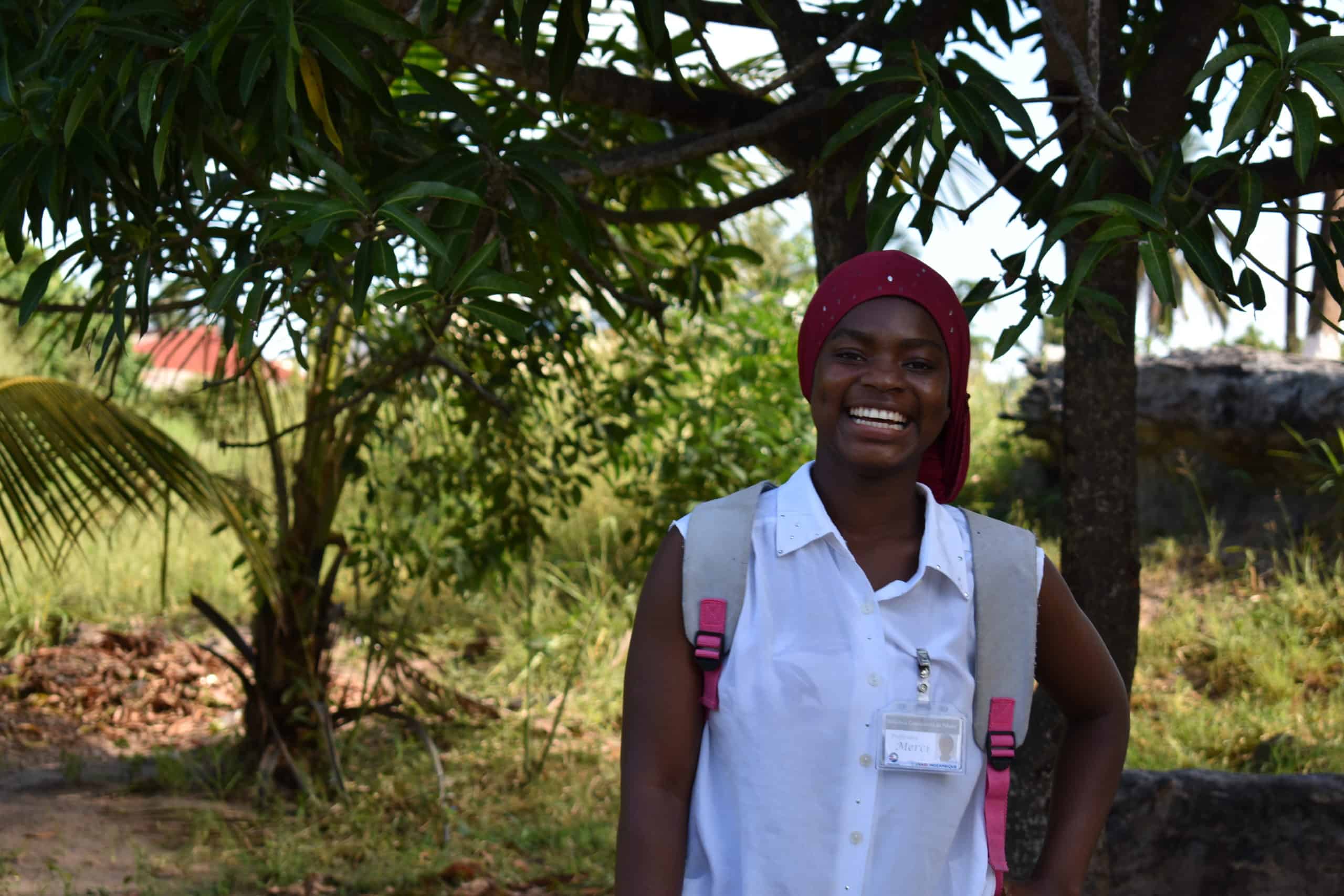A female student from Mozambique poses for a photo.