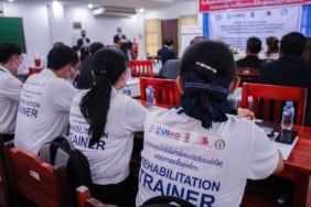 Rehabilitation trainers attend the launch ceremony of the training facility for medical professionals in Laos, supported by USAID, World Education, and the Okard project.