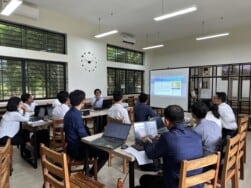 World Education staff working with Cambodia's Ministry of Education, Youth, and Sports staff